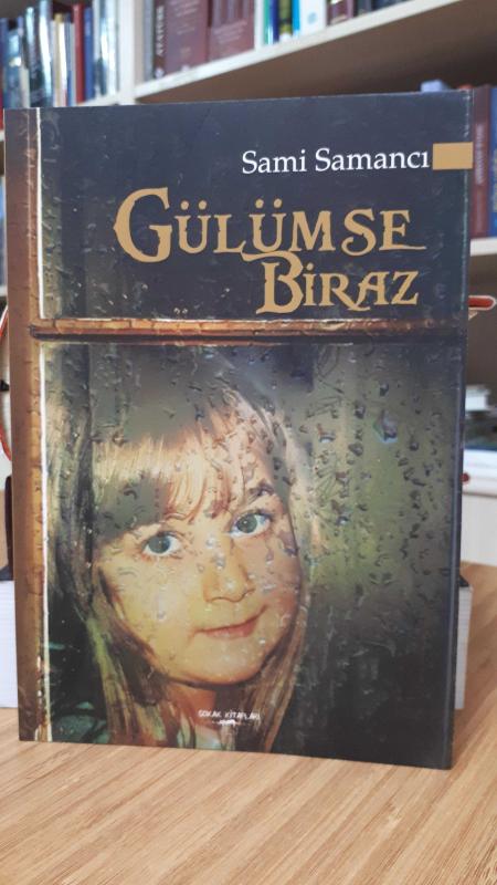Gülümse Biraz
