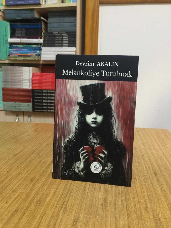Melankoliye Tutulmak - Devrim Akalın